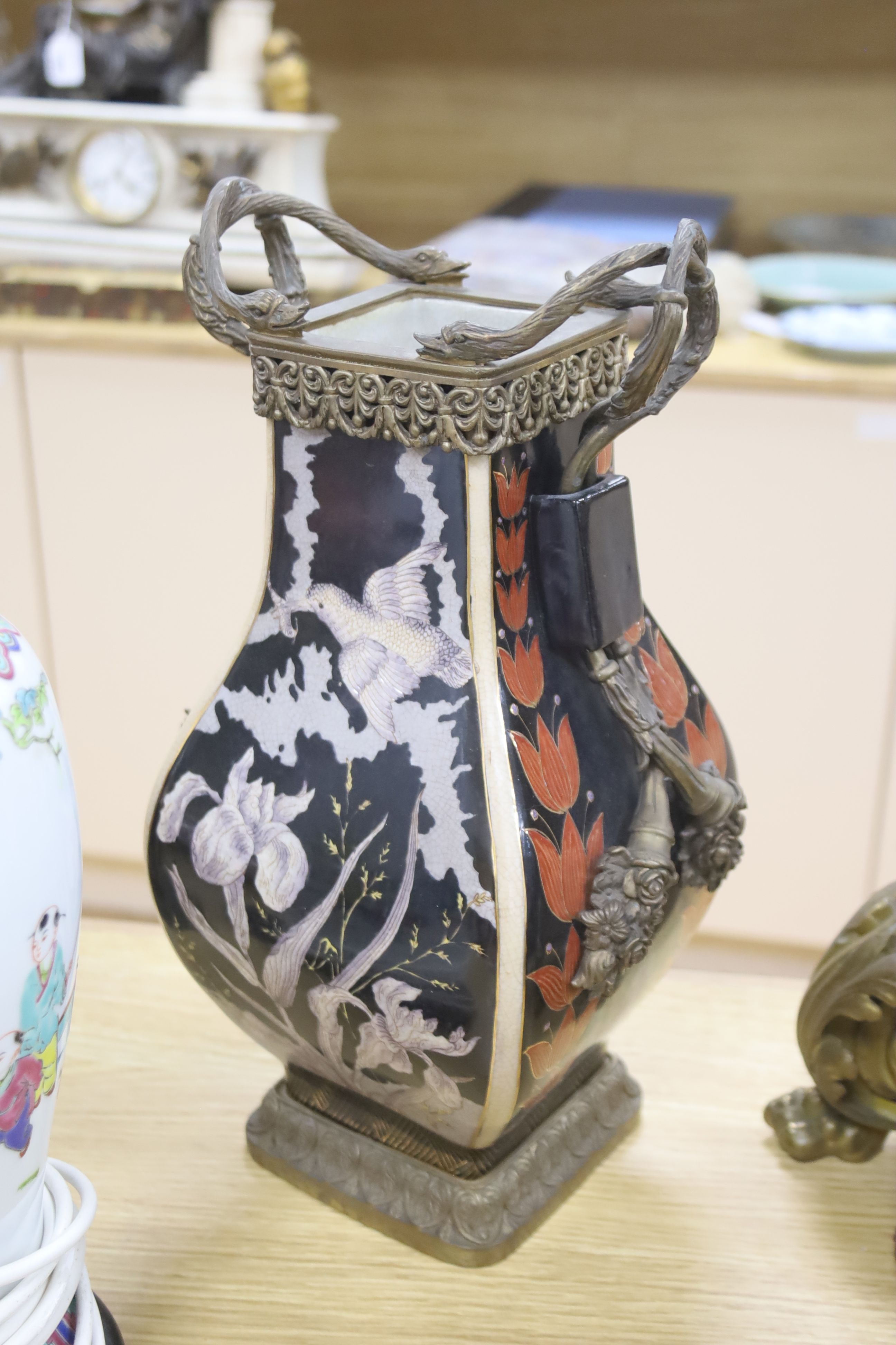 A pair of reproduction French bronze mounted porcelain lamps and a Chinese vase famille rose converted lamp, tallest 39cm